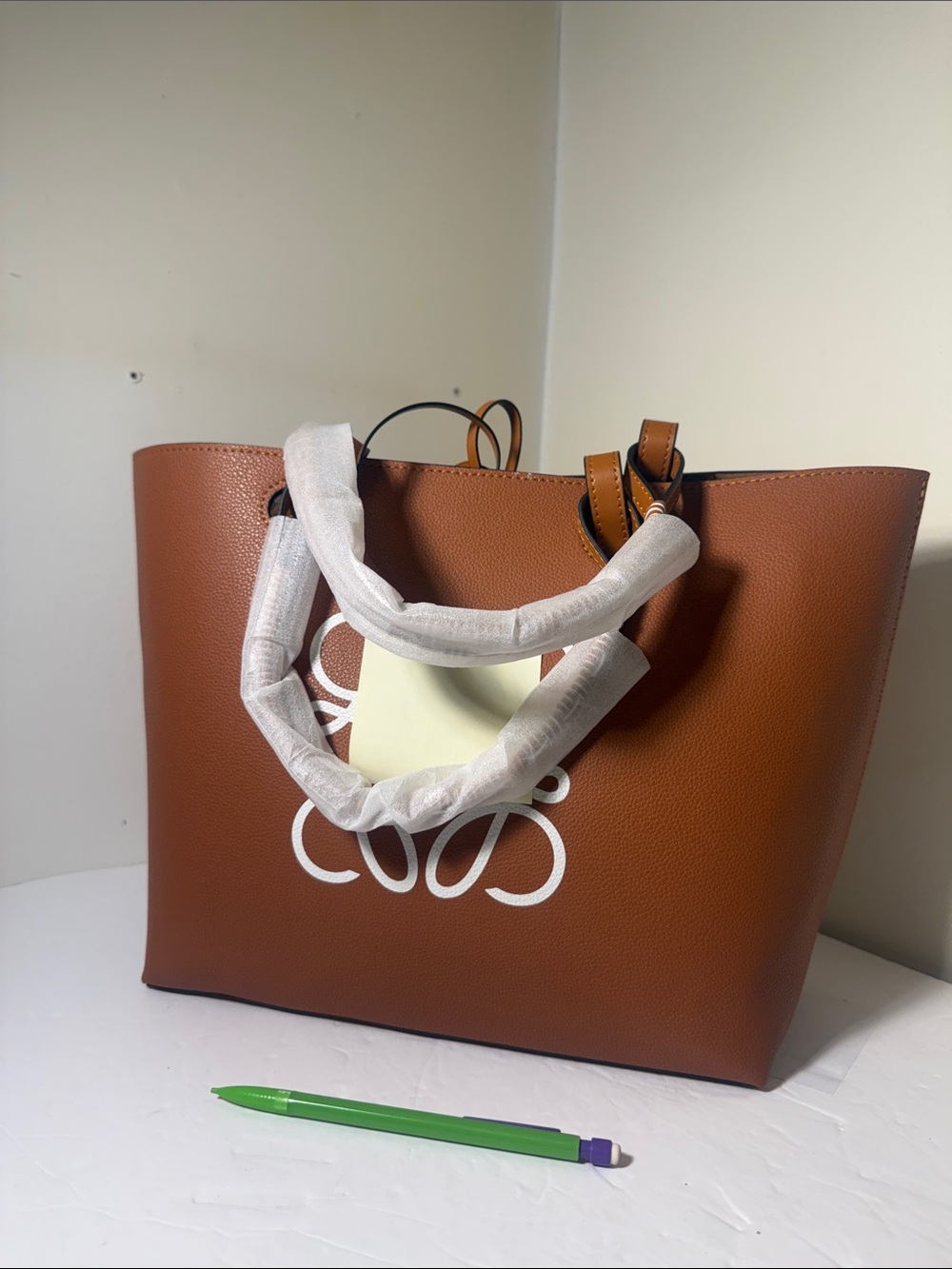 Tan Leather Tote Bag with White Logo Accent